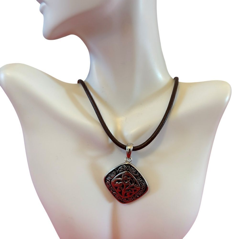 Lia Sophia Silver & Black Pendant on Brown Leather Cord.